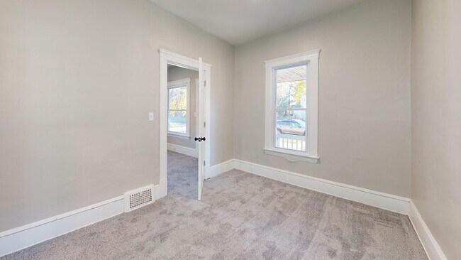 Building Photo - 7408 Dudley Ave