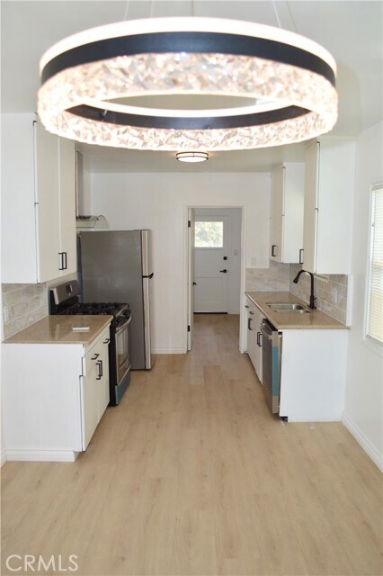 Building Photo - 1303 W 146th St