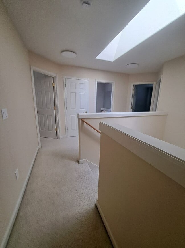 Building Photo - Beautiful setting 4 bedroom A/C Available Now