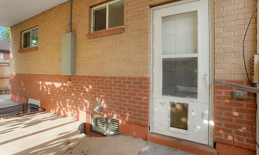 Back Patio with Doggie Door - 7261 Avrum Dr