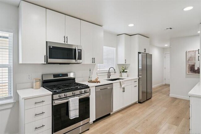 Building Photo - Gorgeous updated and modern open layout