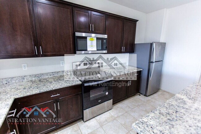 Building Photo - 43620 W Mescal Dr