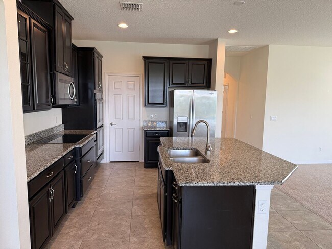 Building Photo - BEAUTIFUL 4 BEDROOMS, 3 BATHS,  SINGLE FAMILY HOME IN HARVEST LANDING IN CLERMONT