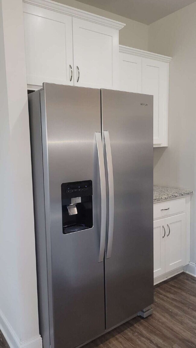Building Photo - Coming Soon!!!  "Spacious 4-Bedroom Retrea...
