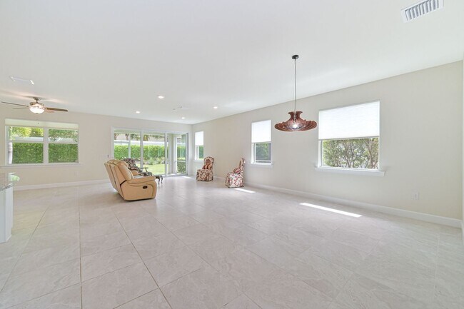 Building Photo - NOW AVAILABLE - 2/2 Plus Den Single Family Home in the Heart of Estero!