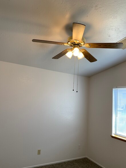 Master bedroom and one additional bedroom with ceiling fan - 654 N Inyo St