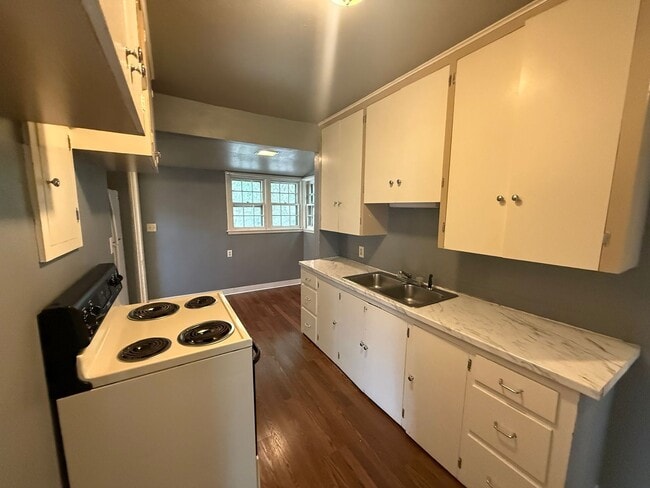 Building Photo - Two bedroom, One and half bathroom house, with additional living room, and bonus room!
