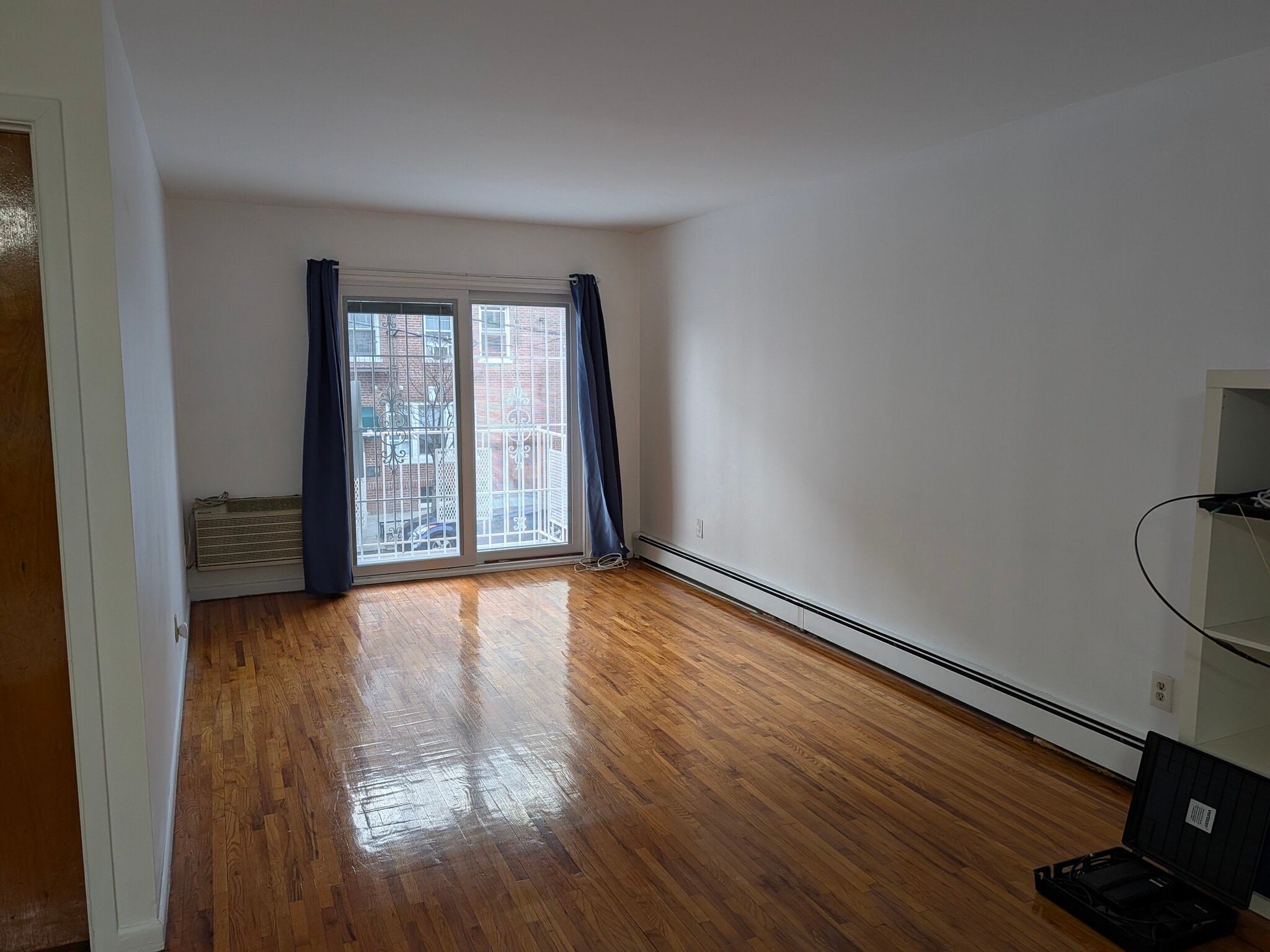Living Room w/Balcony - 3916 62nd St