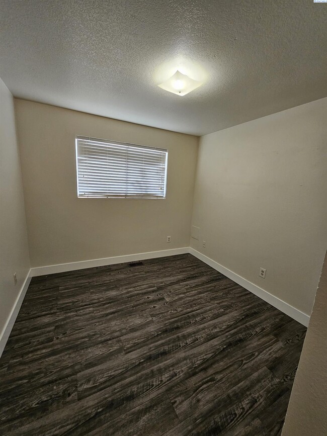 Building Photo - Completely Remodeled Condo; Very Private & Quiet