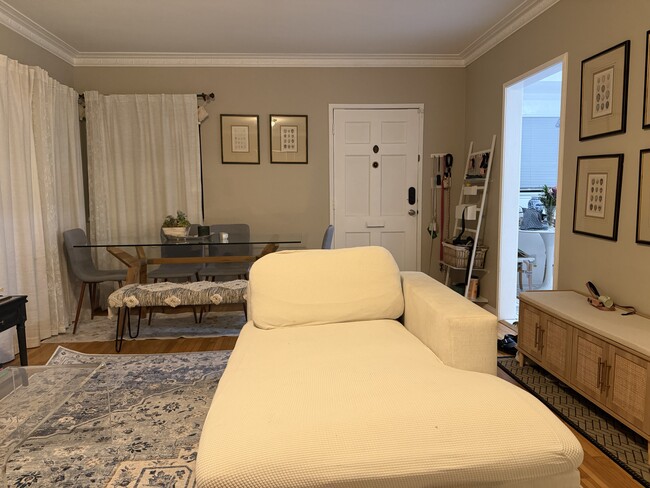 Current — living room towards front door - 4222 Jasmine Ave