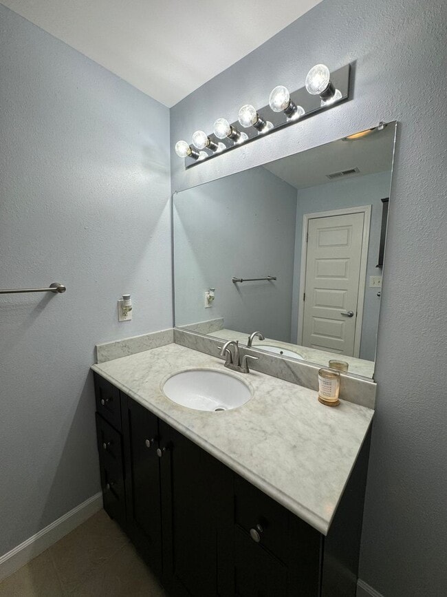 Building Photo - Welcome to this charming bungalow-style home!