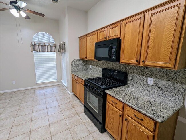 Building Photo - 3821 Pin Oak Dr N