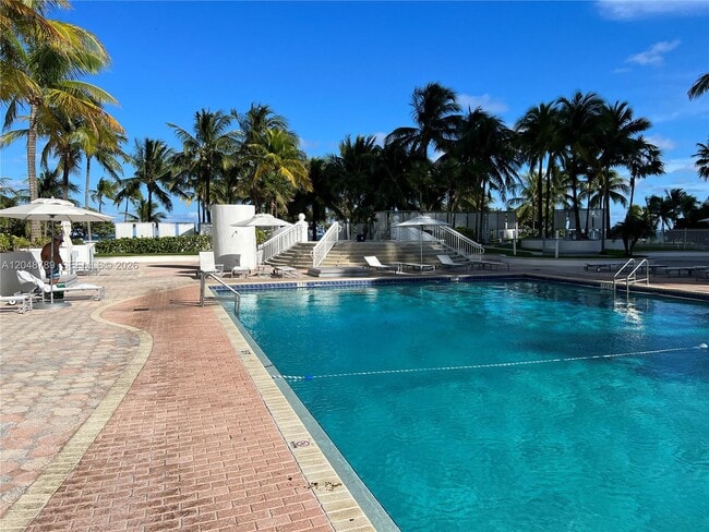 Building Photo - 10275 Collins Ave