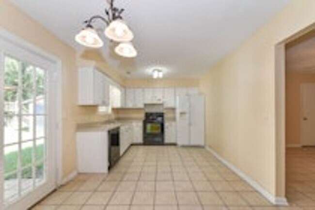 Building Photo - Pet Friendly - Fully Fenced in Yard with Two Storage Buildings