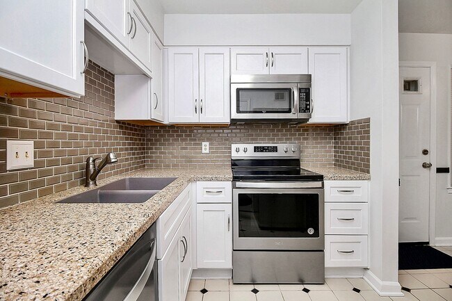 Building Photo - 2-Bedroom in the perfect location! ***First month free with a 13-month lease.***