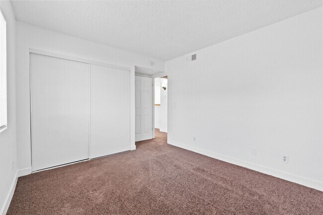 Building Photo - Spacious 2-Bedroom Condo with Fireplace – ...