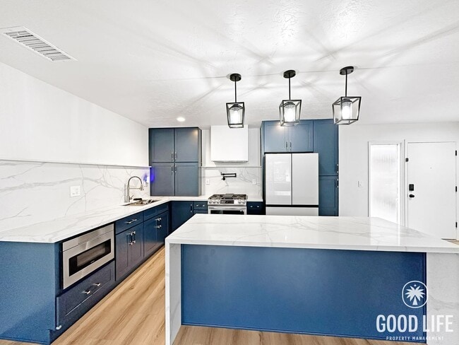 Building Photo - Stylish 2BR in Gated Community | Pool, Jacuzzi & Balcony