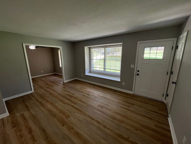 Building Photo - Must See the Sunroom off the Primary Bedroom!