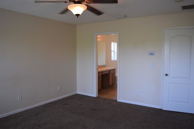 Building Photo - 6796 Gentle Oaks Dr