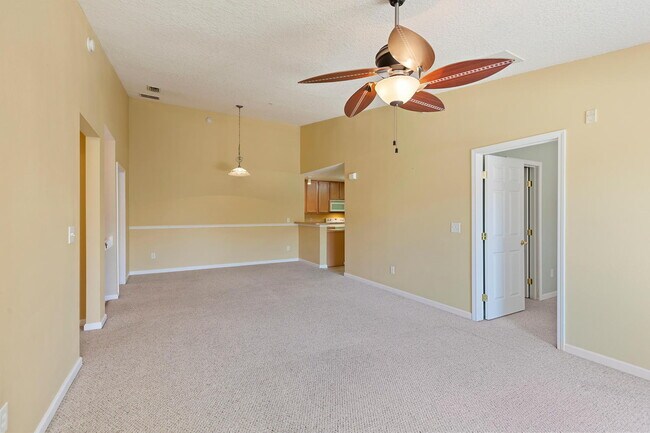 Building Photo - Beautifully Updated & Spacious 3BR/2BA Condo in a Secure Gated Community — Includes Cable, Intern...