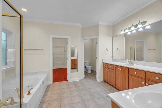 Building Photo - Stunning all-brick home on a large wooded lot