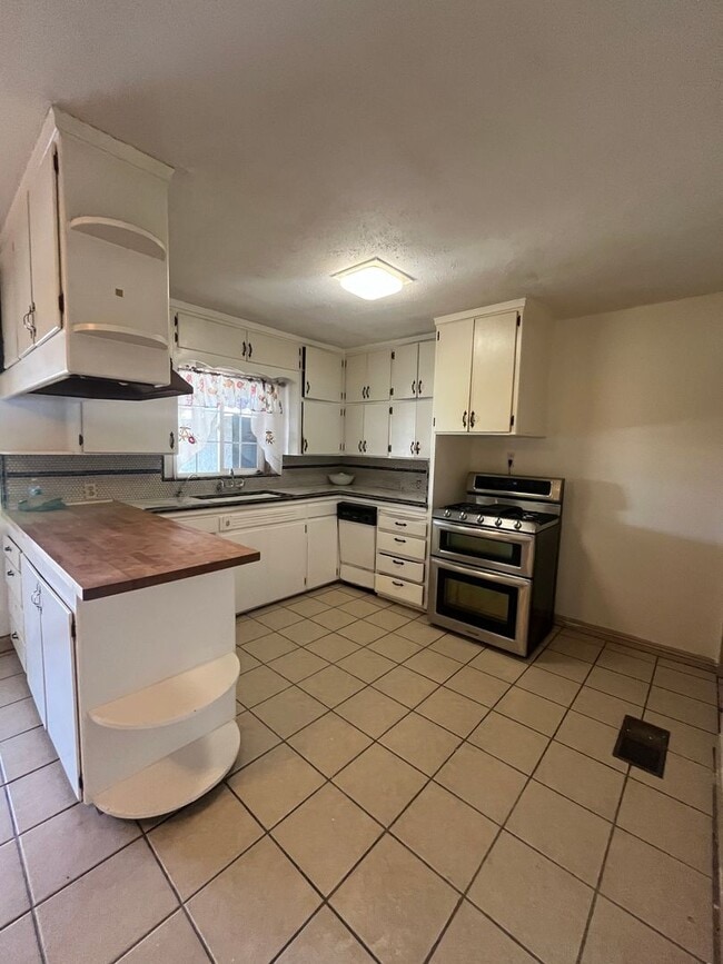 Building Photo - Corcoran Home Coming Soon!