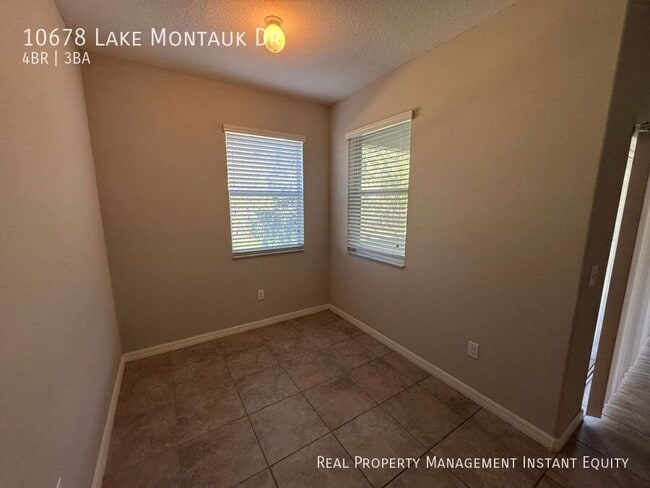 Building Photo - 10678 Lake Montauk Dr