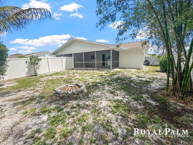 Building Photo - Tree-Lined 2BR/1BA Fort Myers Duplex with Fenced Yard, Storage Shed & In-Unit Laundry!