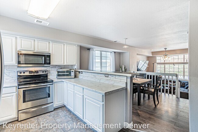 Building Photo - 2 br, 2.5 bath House - 8199 Welby Rd 4201