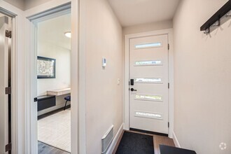 Building Photo - Modern stylings and cutting-edge convenien...