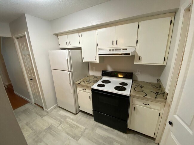 Building Photo - Charming 1BR Home with Loft & Vaulted Ceilings – Fresh Updates & Off-Street Parking!