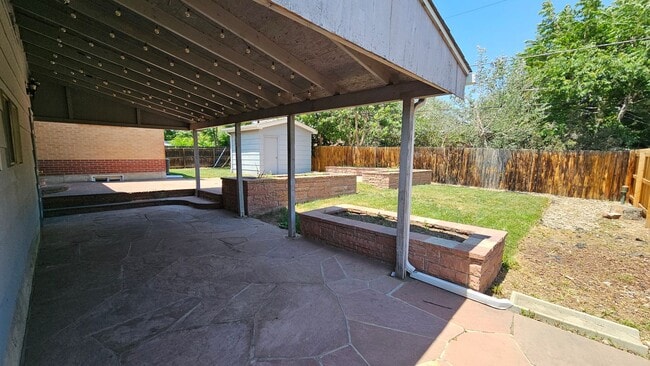 Building Photo - Spacious 5-Bedroom Ranch with Finished Basement & Oversized Garage!