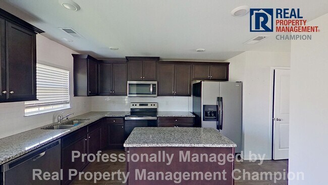 Building Photo - Spacious Home w/Open Living, Fireplace, Fenced Yard & Solar Panels