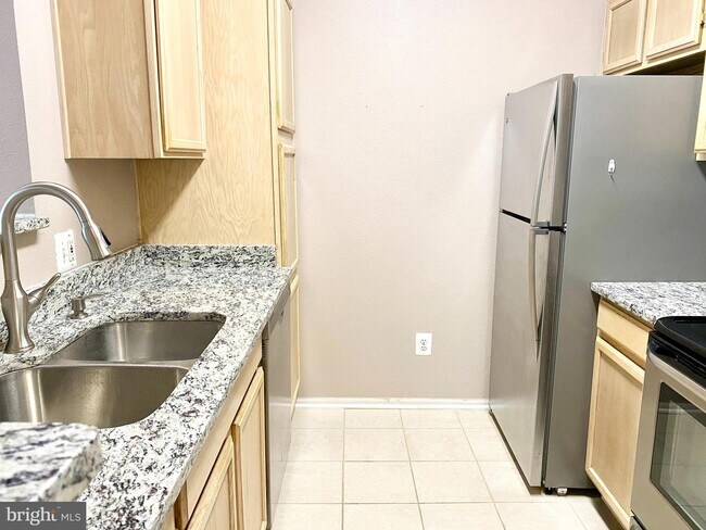 Building Photo - 1600 Spring Gate Dr.