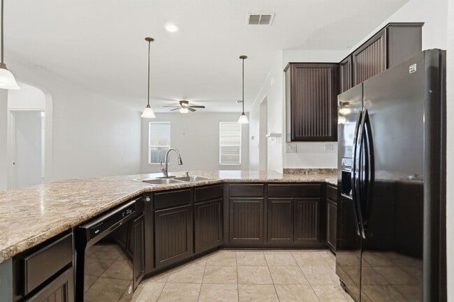 Building Photo - Single-Story Solar-Powered Home Near Braunig Lake – Comfortable & Convenient!