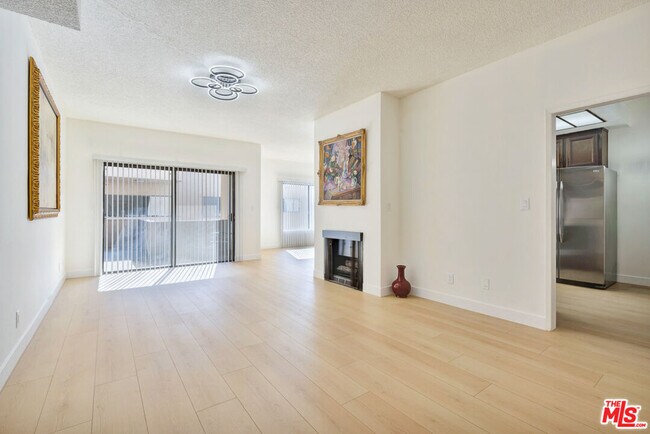 Building Photo - 1727 S Bentley Ave