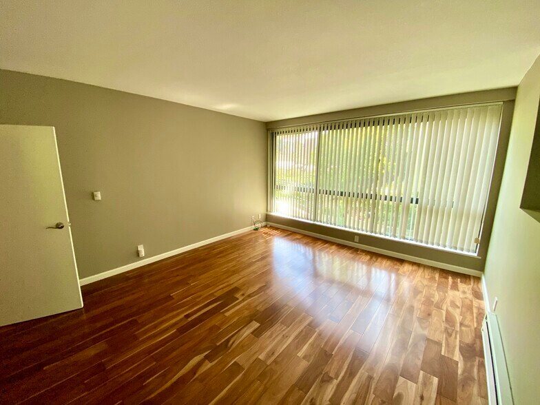 Large bedroom, floor to ceiling windows - 300 3rd St