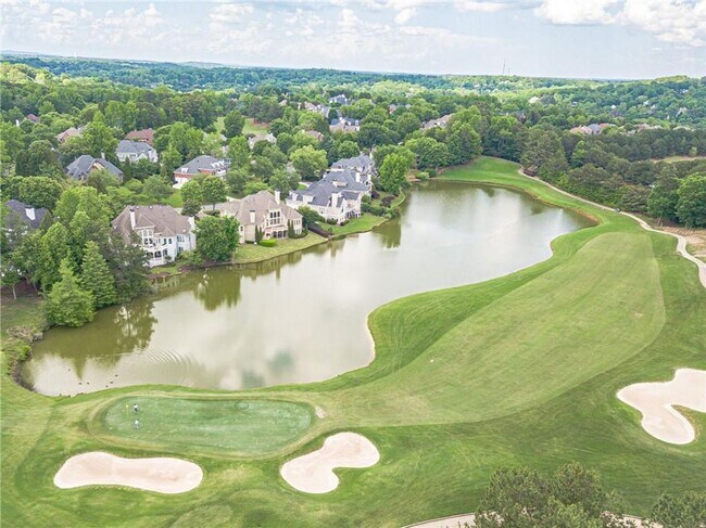 Building Photo - Elegant Master-on-Main in Prestigious Laur...