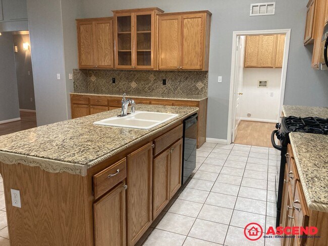 Building Photo - Spacious 4 Bedroom + Office Home with Gated Pool & 3-Car Garage