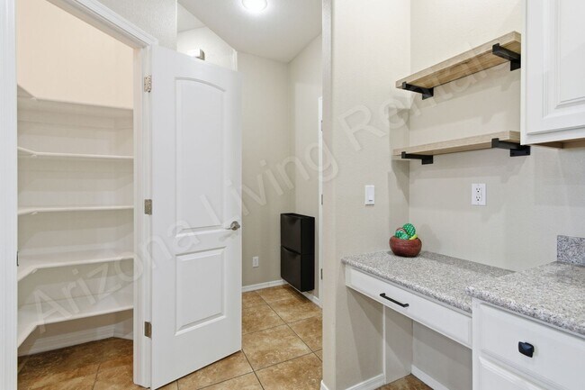 Building Photo - CENTRALLY LOCATED LA COSTA TOWNHOME