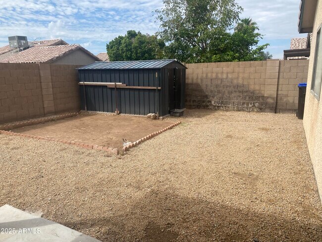 Building Photo - 8563 W Mission Ln