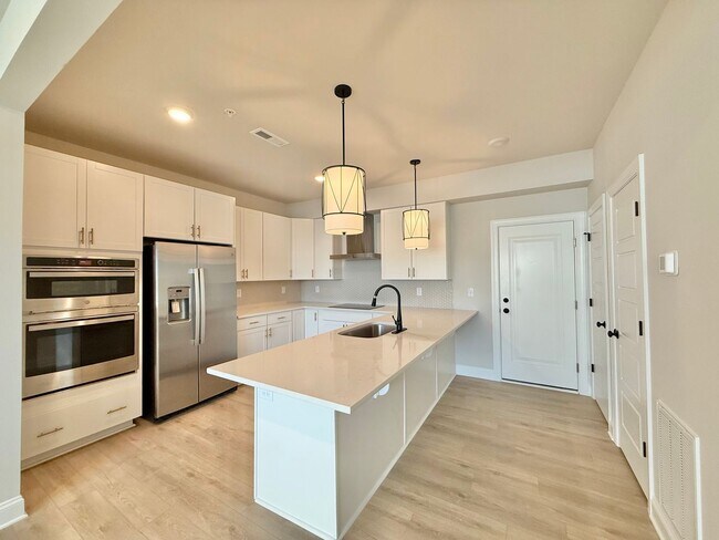 Building Photo - Stunning New Construction 2BD, 2.5BA Cary Townhome-Style Condo with a 1-Car Garage, EV Charging C...