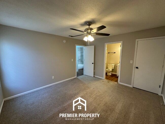 Building Photo - Spacious 4BR/2BA Home in 38141 | Vinyl Flooring & Large Fenced Backyard