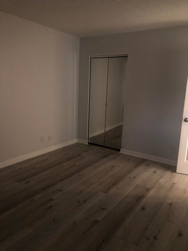 Second bedroom closet with mirror door - 2825 SW 22nd Ave