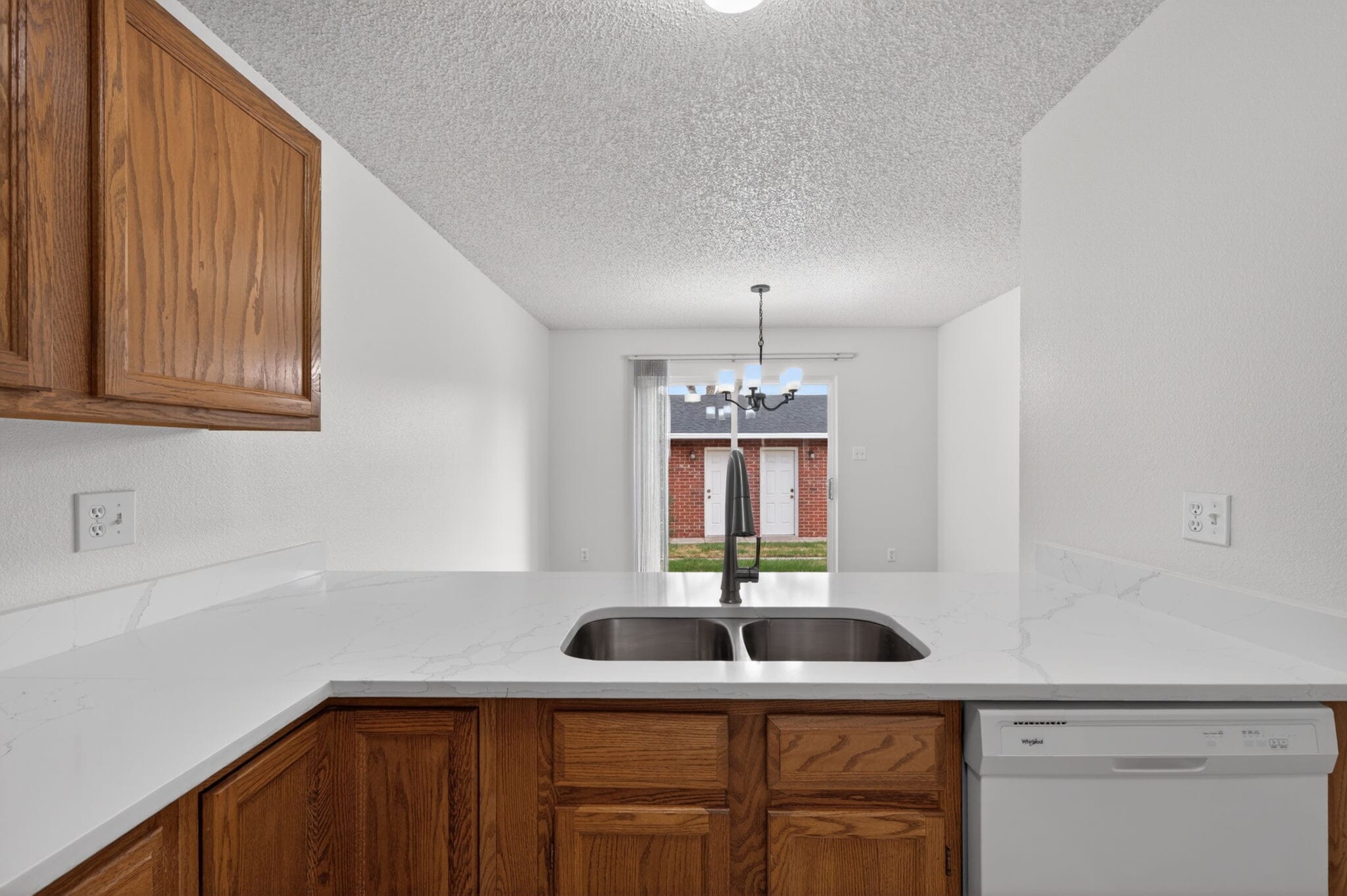 solid surface countertops with upgraded plumbing fixtures - 4502 E 12th St