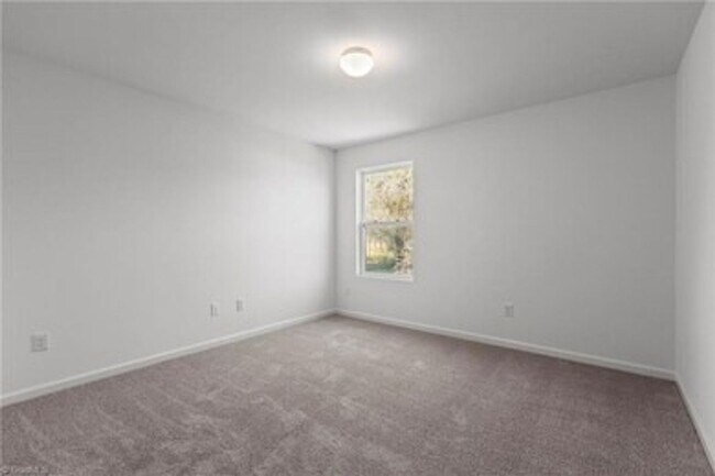 Building Photo - Spacious 3-Bedroom Townhome with Private Patio, Central HVAC & In-Unit Laundry Hookups