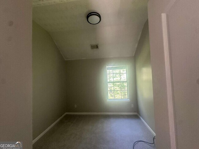 Building Photo - 7467 Petunia Dr