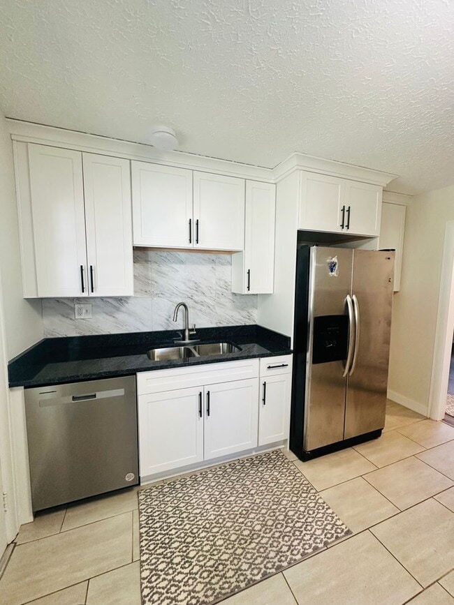 Building Photo - Charming and Updated Cul-de-Sac Gem with Year-Round Sunroom and Spacious Backyard!