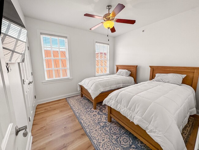 Building Photo - Fully Furnished Waterfront Elegance on Mai...