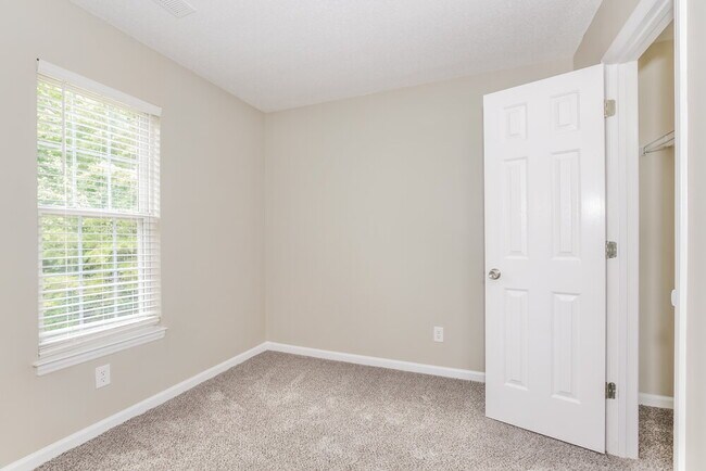Building Photo - 5209 Carriage Woods Dr